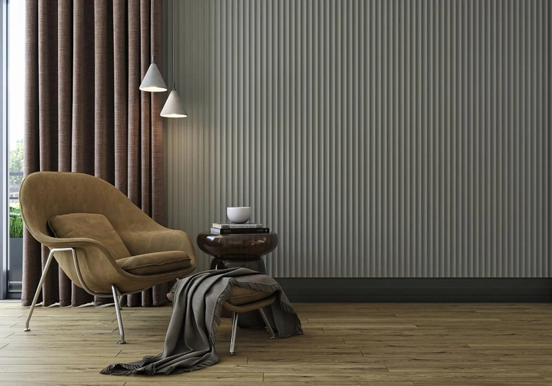 Grey fluted wall cladding in a modern interior.
