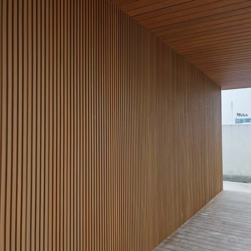 Seamless light oak vertical slat cladding on a patio