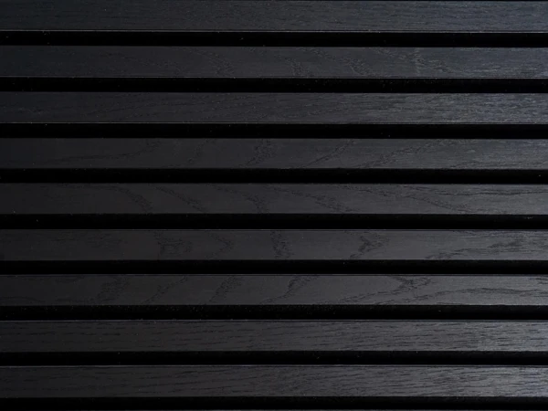 Black Ash wood slat wall paneling with a subtle ash wood texture and black felt backing